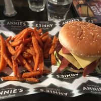 The Reggie - vegan version: brioche bun, vegan bacon, vegan cheese, vegan mayo, hashbrown, lettuce with sweet potato fries at Annie's Burger Shack in Nottingham