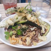 Plate of the day: soba noodles, fried asparagus, zucchinis and peanuts. With satay sauce.  at Chéri Coco in Pantin