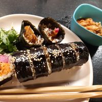 Main: Tofu Teriyaki Roll and vegan kimchi at Mama Uma in Madrid