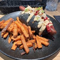Daily lunch - vegan hot dog and sweet potato fries 🍟   at Green One BTC in Ljubljana