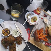 Vegan burger, sweet patatoe fries and indian dish (veggies) with mango chutney 😍 at Phoenix Belgian Vegg in Malaga