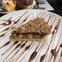 Snickers tart (banana split in the background being demolished) at Phoenix Belgian Vegg in Malaga