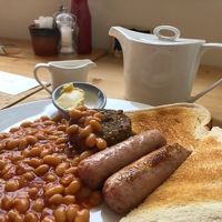 The small vegan breakfast, delicious haggis and juicy sausages. £5.50 👍 at The Midge Bite Cafe in Achnasheen