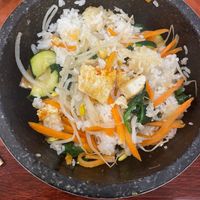 Veggies and tofu over rice in stone bowl at Mr Tofu House in Wayne