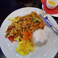 Vegan chicken indonesian style with curry and coconut milk at Tau in Vienna