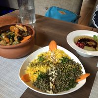 Tajin , baba ghanoush, and a dish of rice, wheat, nuts and spices at Forever in Malmo