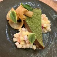 Savory pecan tart with apples, radish, and tarragon.  at Oyster Oyster in Washington