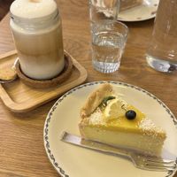 2 vegan cakes of the day, cookie next to coffee probably not vegan, next time I will ask for one without a cookie  at Kafi Franz in St Gallen