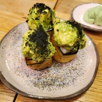 Wrapped in eggplant, topped with avo at Youmiko Sushi - Narbutta in Warsaw