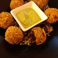 Croquetas de frijoles negros con salsa de aguacate at Guasa in Madrid