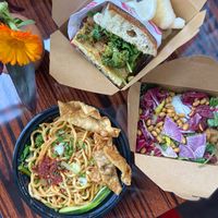 Sambal wanton mee, shaobing sandwich, sesame salad  at Lion Dance Cafe in Oakland