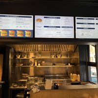 Menu board and kitchen  at Eden Jaxx in Copenhagen