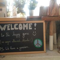 Sign at The Happy Nest in Porto