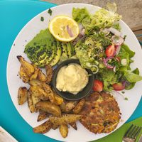 Vegetable steak with potatoes, mayonnaise, and salad at 1001 Saveurs Sauvages in Ajaccio