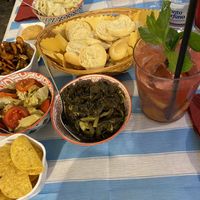 Mix di verdure sott’olio, chips e friselle - e il cocktail 🍹  at Ciccinedda Fruit Bistrot in Ostuni