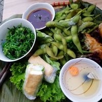 Fingerfood dish with springrolls, summerrolls and various vegetables at Tonkin in Flensburg