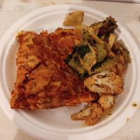 Soy ragu lasagna with cauliflower and tempeh vegetables at Jaa Nu' Rosticceria Vegana in Genoa