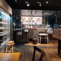 The inside of the restaurant and the menu with a lot of vegan options at Ganjin Shokudo 鑑真食堂 in Kumamoto