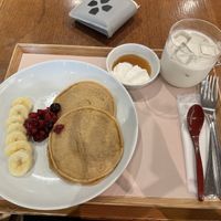 Vegan pancakes with soy milk whipped cream and fresh fruit! Iced coconut and soy milk for the win 🤩  at Ganjin Shokudo 鑑真食堂 in Kumamoto