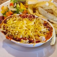 Homemade vegan lasagna, chips + salad! at The Royal in Barmouth