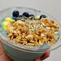The Fiji Bowl: Blue base (blue spirulina, banana, pineapple) topped with granola, blueberries, pineapple, hemp hearts, agave and peanut butter.   at The Wild Banana in Dayton