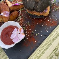 "pescado" burger y papas gajo  at Naked in San Luis Potosi