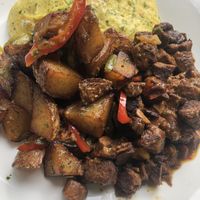 Steak meal with JustEgg omelette and roasted potatoes   at Vegan Hood in New York City