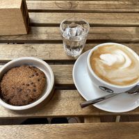 Soy milk cappuccino and vegan choc chip cookies at UNO Caffé Olistico in Bologna