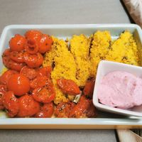Tomatoes and stuffed zucchini, plus vegan mayo at UNO Caffé Olistico in Bologna