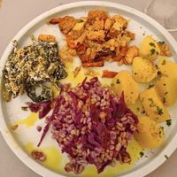 Daily mix (spinach with almond cheese, perseley with purple gabbage, potatoes and tofu with veggie) at UNO Caffé Olistico in Bologna