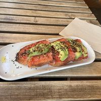 Tomato Avocado Toast   at UNO Caffé Olistico in Bologna