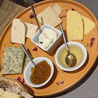 Vegan cheese board at UNO Caffé Olistico in Bologna