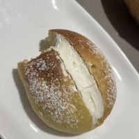 brioche con nata vegana  at UNO Caffé Olistico in Bologna