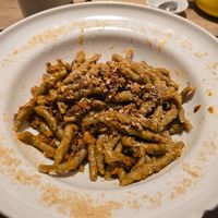 Strozzapreti pasta with soy ragù at UNO Caffé Olistico in Bologna