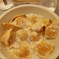 Homemade pasta stuffed with pumpkins, tofu, shiitake mushrooms and vegan cream sauce. Best pasta dish I've eaten in Bologna so far? Probably. at UNO Caffé Olistico in Bologna