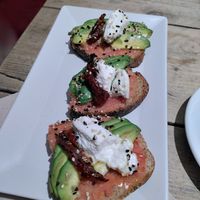 Tostadas at UNO Caffé Olistico in Bologna