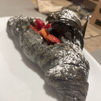Croissant with berries  at UNO Caffé Olistico in Bologna