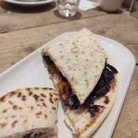 Pianida with vegan ricotta and seasonal vegetables at UNO Caffé Olistico in Bologna