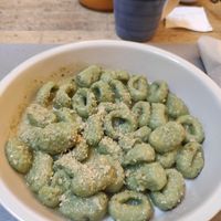 Gnocchi verde at UNO Caffé Olistico in Bologna
