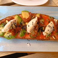 avo toast at UNO Caffé Olistico in Bologna