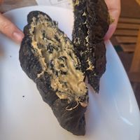 Coal Croissant with Pistacchio at UNO Caffé Olistico in Bologna