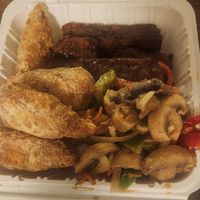 Drummies, ribs and mushroom salad at Dodah's Kitchen in Baltimore