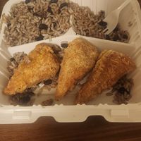 Drummies with rice and beans at Dodah's Kitchen in Baltimore