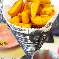 Patatas bravas / spicy potatoes at Fronteira Gastrobar Tapas Wines Gins in Valenca