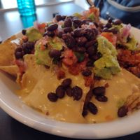 These nachos drenched in cheeze defied science & stayed crunchy to the last bite at Madame Zuzu's in Highland Park