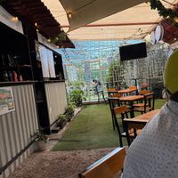 Seating area (covered outdoor) at El Monchis Vegano in Mexico City
