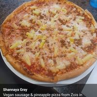 Vegan sausage and pineapple pizza! at Zois Pizza in Seymour