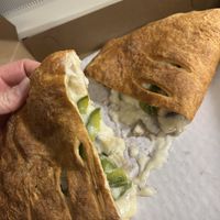 Mushroom and pepper calzone  at Zois Pizza in Seymour