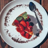 APHRODITE Cheesecake 								
Organic – Sugar free - Gluten free. Vegan cheesecake with coconut and homemade cashew cream, dates, and homemade strawberry jam.
 at Hippocrates Healthy Eatery in Randwick