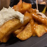 Patatas 3 salsas (cabrales, picante y miel mostaza ) at Cerveceria La Raposa in Oviedo